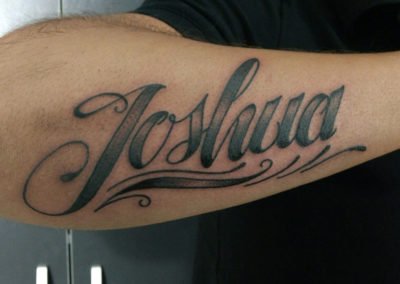 image of a name tattoo done by Mike Welch of Skin Deep